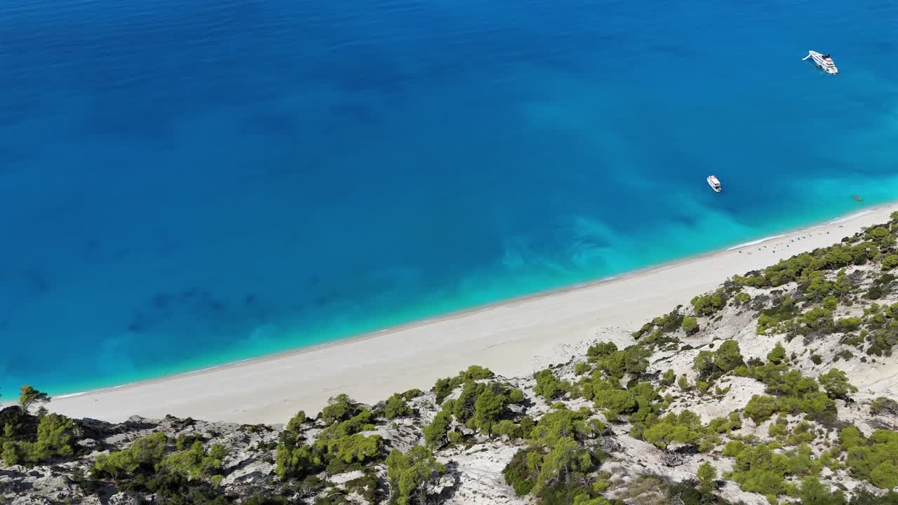 Greece,Ionian Islands,West Coast of Lefkada, Aerial birds eye view of Egremni Beach, from the steep cliff towards the deep blue sea