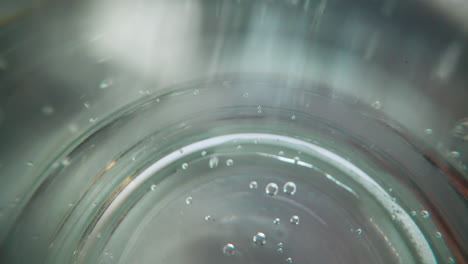 fresh sparkling water with small bubbles in clean glass