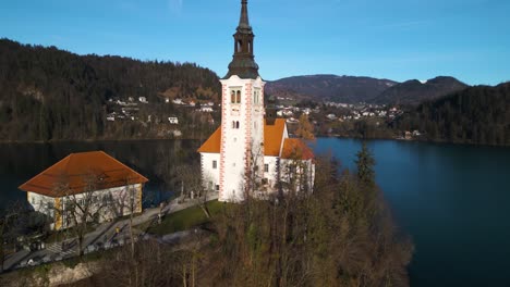 cinematic establishing drone shot of lake bled, romantic destination in slovenia