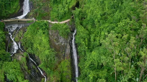 aerial top down of kerta gangga waterfall in the jungle of lombok