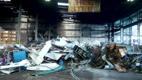 tin and steel cans, aluminum, and sheet metal in a recycling plant