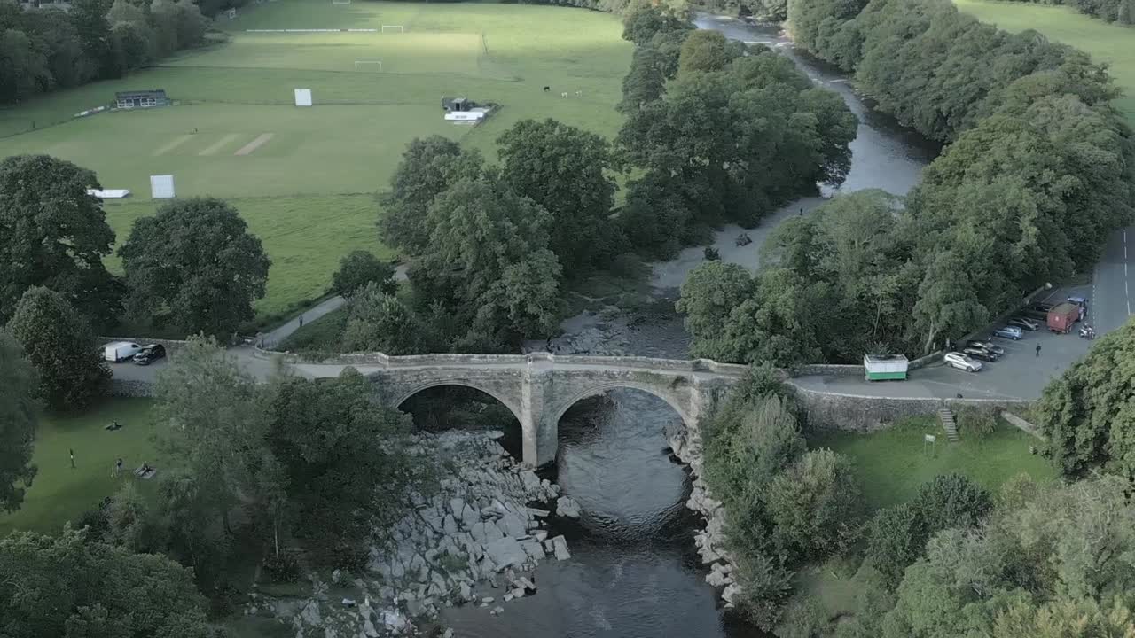 An aerial view of the Devil's Bridge at Kirkby Lonsdale on a summer evening, Yorkshire, England, UK
