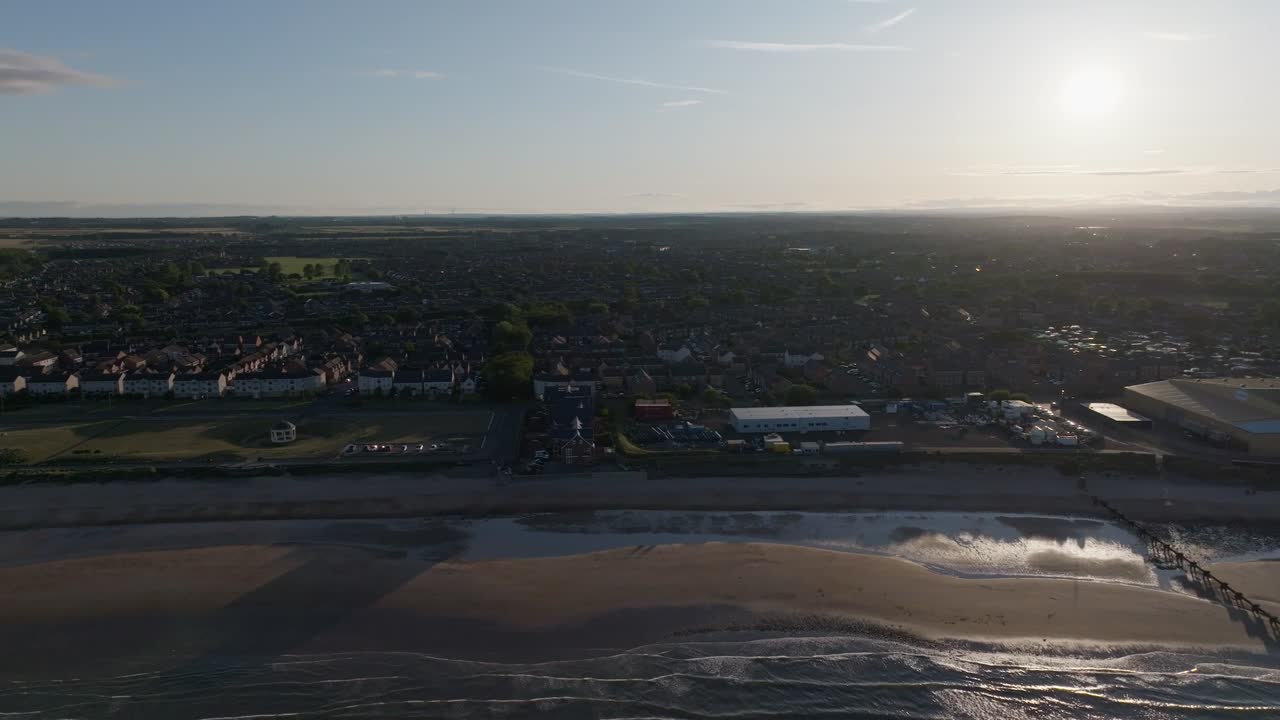 Drone clip showing sandy beach and seaside town of Blyth, Northumberland