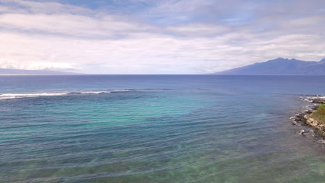 crystal clear water of pacific ocean at coast of maui island, hawaii