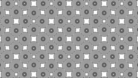patrón gráfico en blanco y negro con efecto estroboscópico e hipnótico, mientras aumenta en tamaño y luego lo reduce.