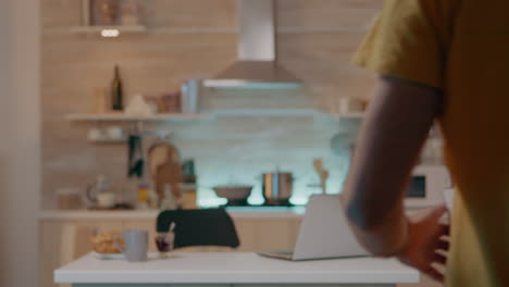 man holding tablet with lighting control application