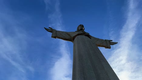 Close-up-of-Sanctuary-of-Christ-the-King-of-Portugal-with-blue-sky-4K