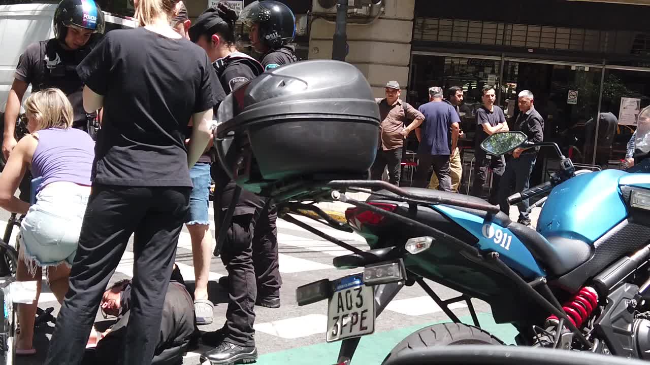 POV driving at bicycle pizza delivery crash accident at the streets of buenos aires city argentina with police officers at service