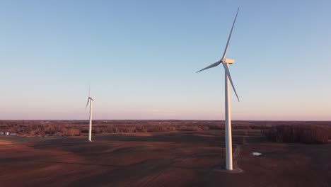 a scenic view of michigan wind turbines in ubly,  michigan with beautiful skyline on the background.-wide shot