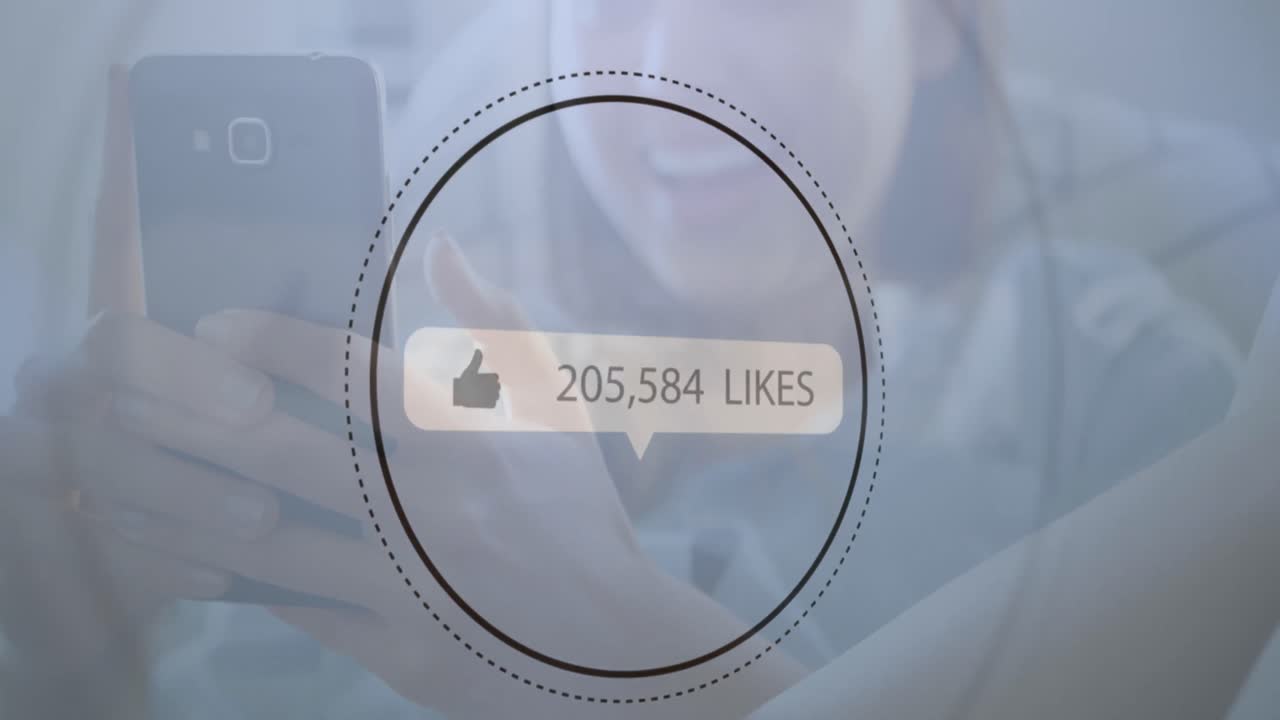 Speech bubble with thumbs up icon and increasing numbers against woman using smartphone