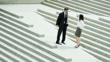 handshake of multi ethnic male and female entrepreneurs