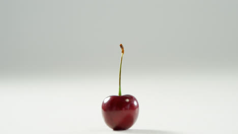 Isolated-red-cherry-placed-on-white-background-4K-4k