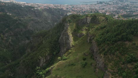 aerial view of city funchal on madeira island seen from green mountains