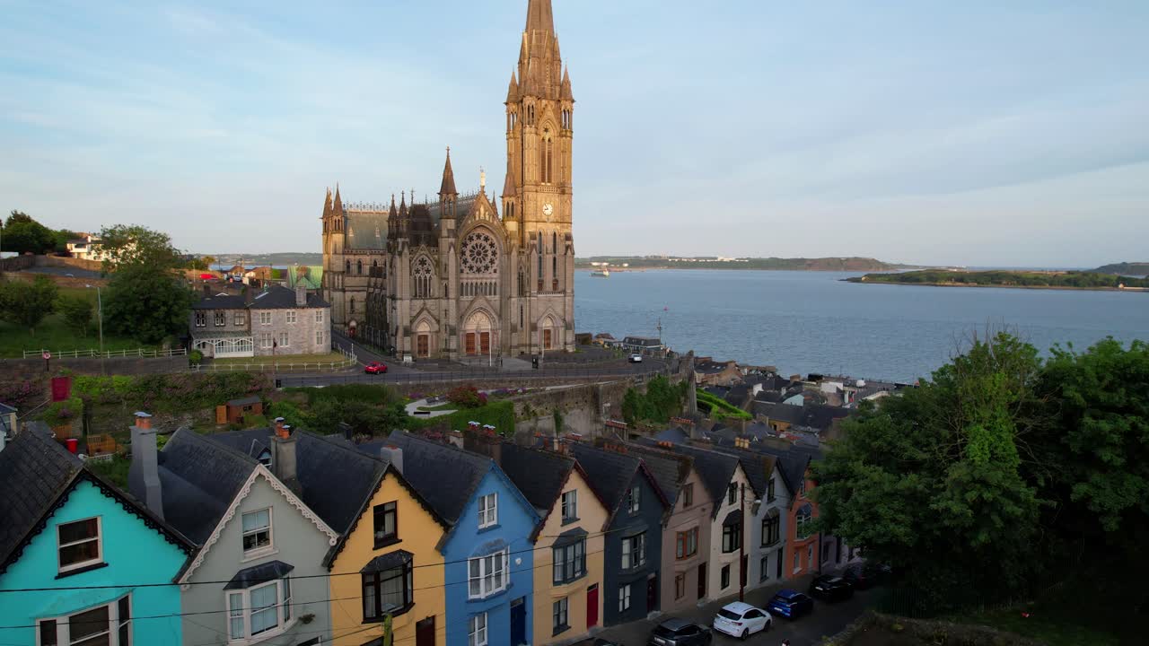 Picturesque colorful town of Cobh in Ireland with St Colman's Cathedral, aerial