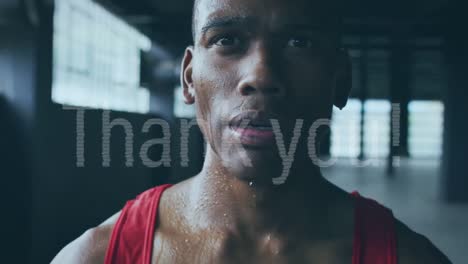 animation of thank you text over african american sportsman at gym