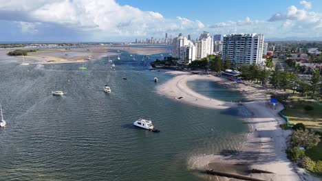 coastal city bay with boats and beach