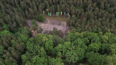 An-aerial-view-of-Valmiera-city,-showcasing-its-blend-of-urban-and-natural-elements