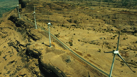 aerial view of wind farm in a dry mountainous region