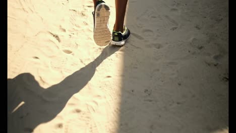 african american male runner jogging near beach 4k