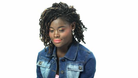 Young-African-American-Teenager-20s-Woman-black-alfro-hair-with-cosmetic-make-up-on-face-look-in-t-shirt-jean-jacket-express-emotion-on-white-background-for-viral-clip-Casting-or-advertising