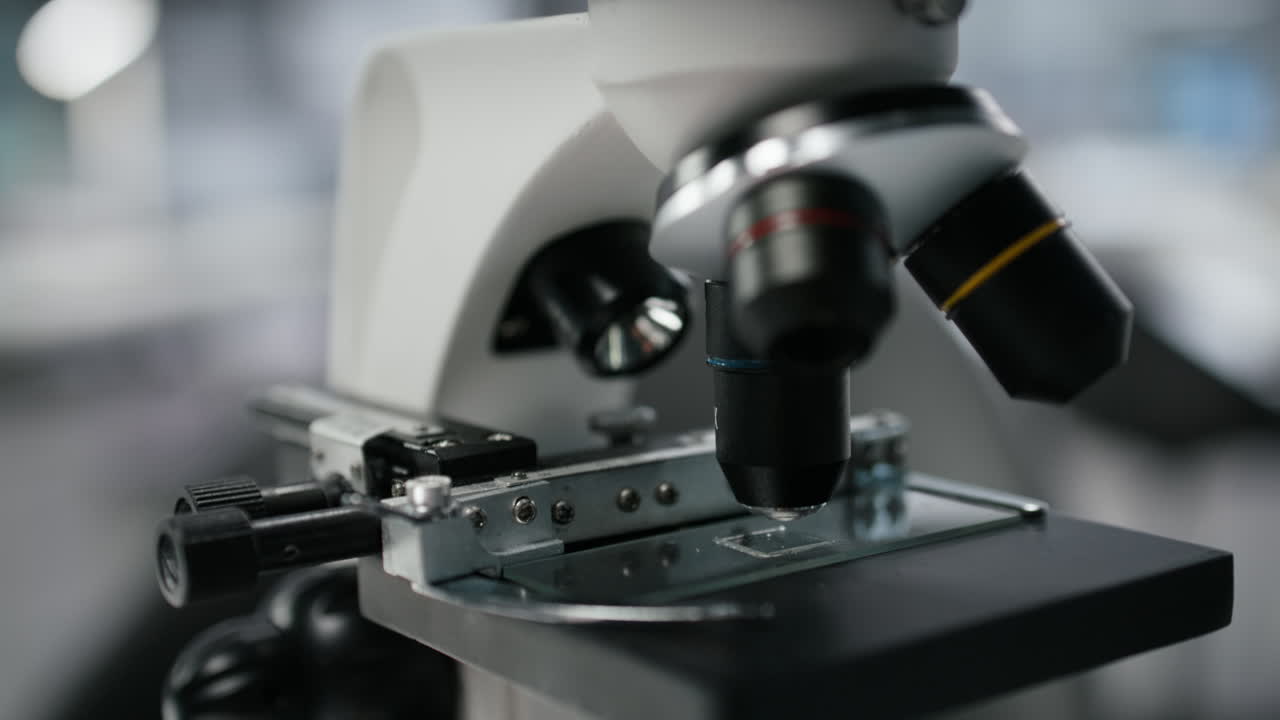 Close up of microscope on workbench in sterile empty hospital laboratory