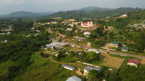 aerial view approaching the roman catholic diocese of ebolowa, in sunny cameroon