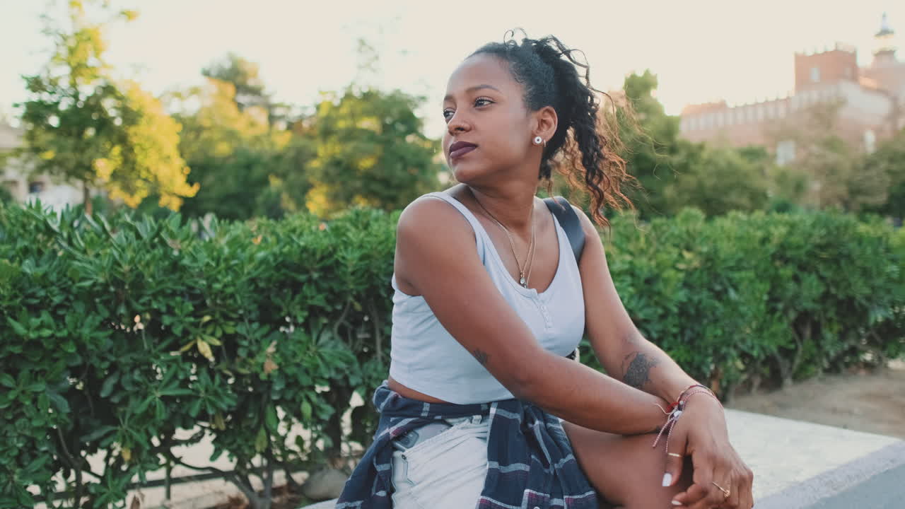 A woman sitting in a park