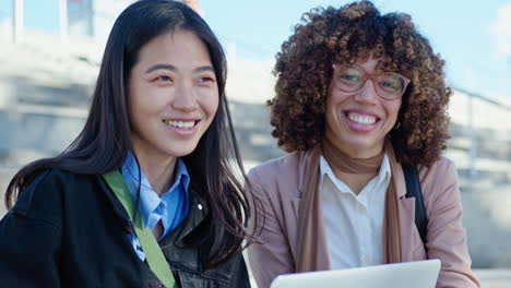Young Smiling Businesswomen Sitting with Laptop Outdoors and Posing at Camera