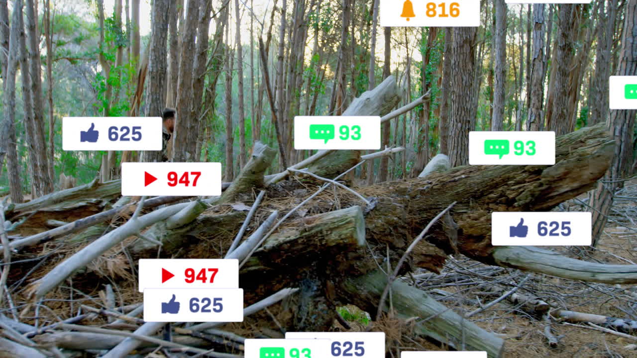 Man wearing camouflage crouching in pine forest, displaying floating social media marketing icons