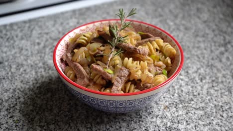 bowl of pasta with meat