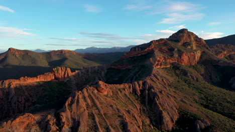 Mountains-and-blue-sky-Track-out-Drone-shot-in-slow-motion