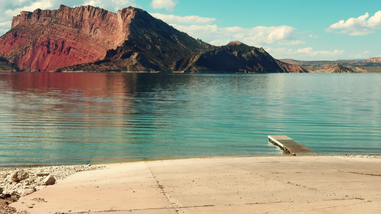 Idyllic View Of A Lake With Boat Ramp. Zoom In Shot