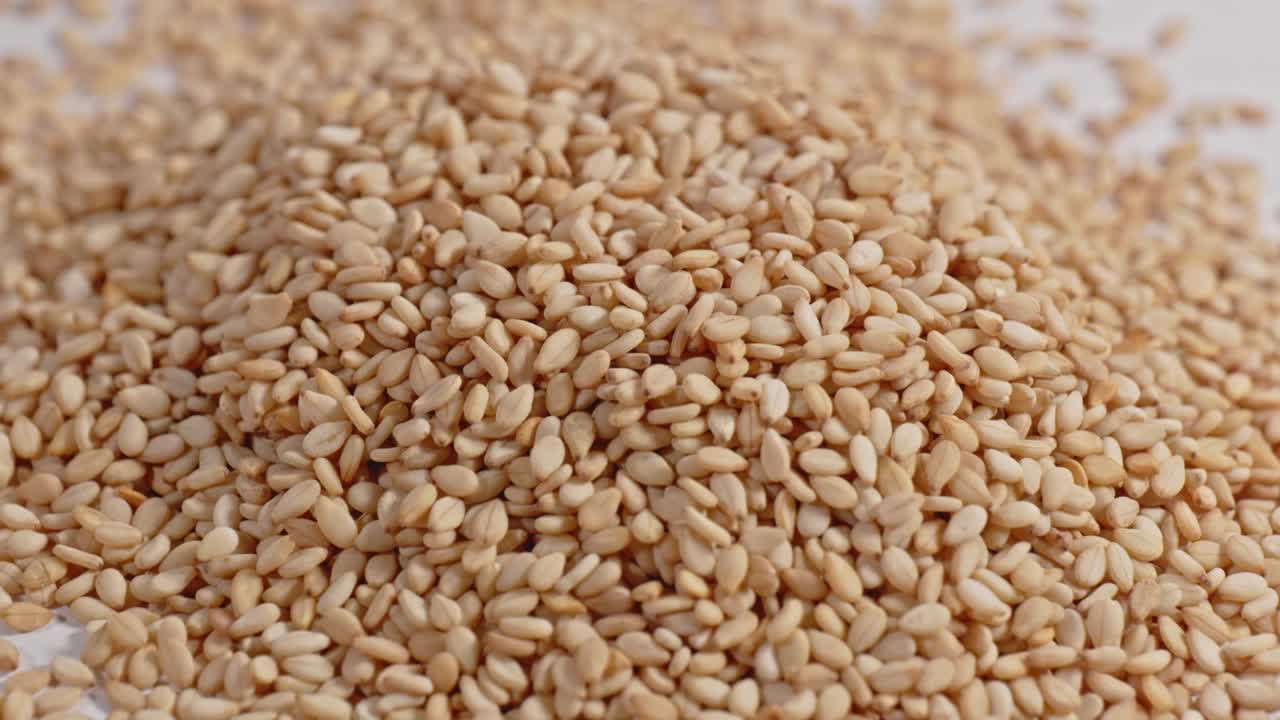 sesame seeds closeup, parallax shot, 4k.