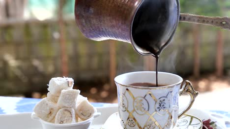 turkish delight and coffee served on the table