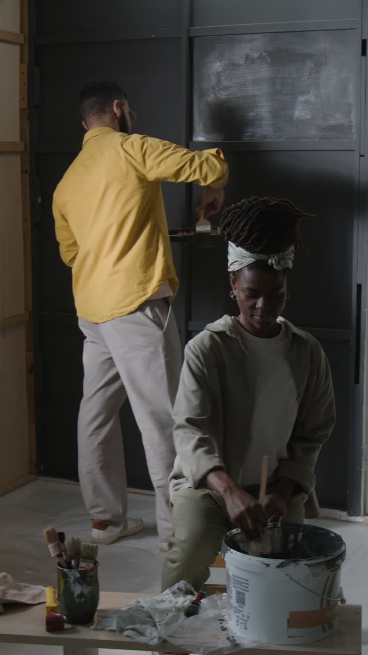 Artists Painting in Studio