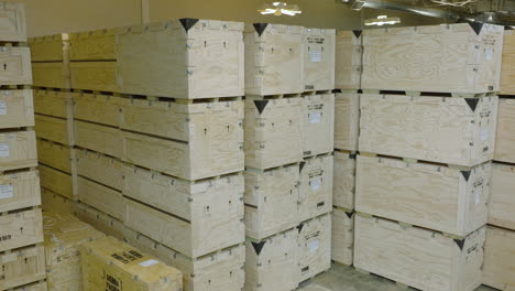 industrial wooden crates stacked in a warehouse