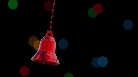 animation of christmas red bell bauble decoration over black background