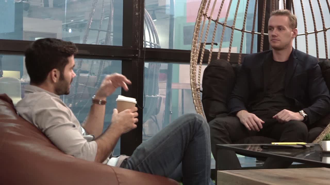 Office worker relax at coffee corner while taking a short break from work.