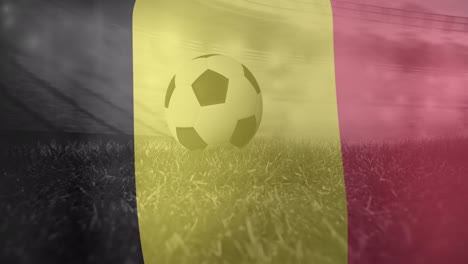 animation of flag of belgium over football on stadium