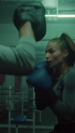 female boxer training session