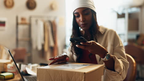 ecommerce, box and woman with phone in office