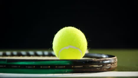 Tennis-ball-on-racket-in-court-4k