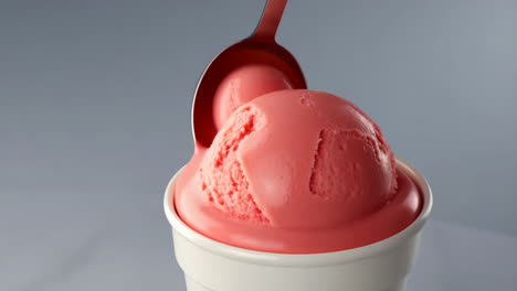 scooping pink ice cream