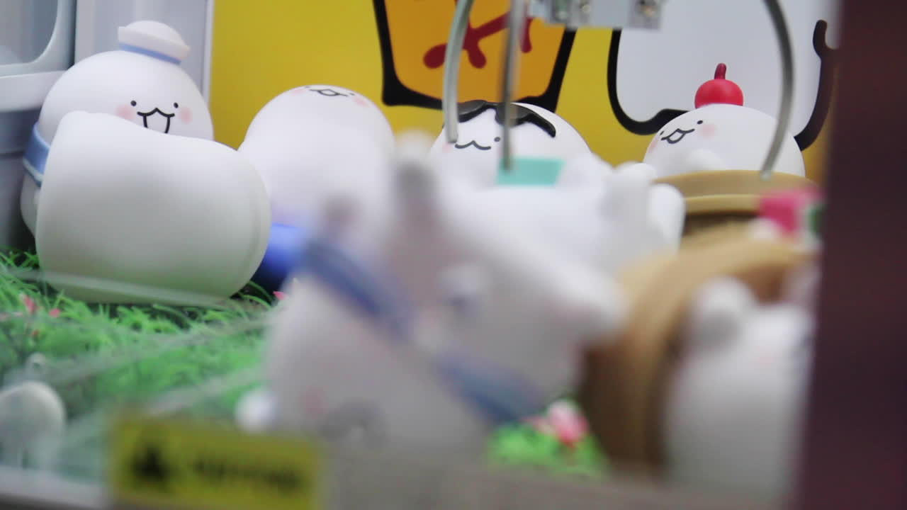 장난감 아케이드는 한국에서 장난감을 잡으려고 시도