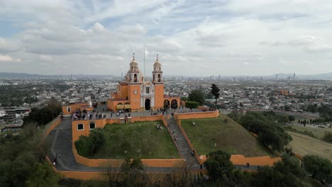 aerial view of cholula pyramid and church at noon