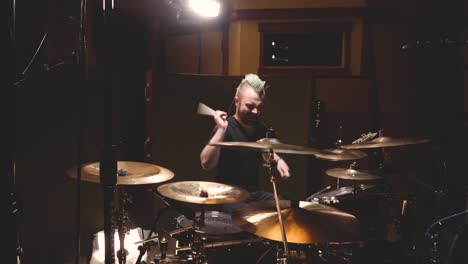 drummer performing in a studio setting