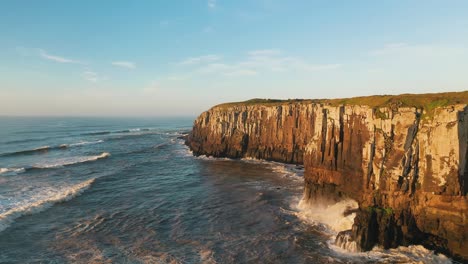 Amazing-aerial-view-near-high-cliffs-on-atlantic-ocean,-Guarita-Park,-Brazilian-Conservation-Unit-located-in-the-southern-region,-State-of-Rio-Grande-do-Sul,-Torres-City