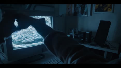 hands interacting with a vintage tv