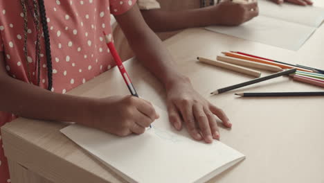 african girls learning drawing
