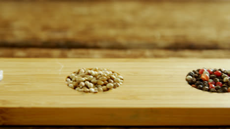 various spices in wooden tray 4k